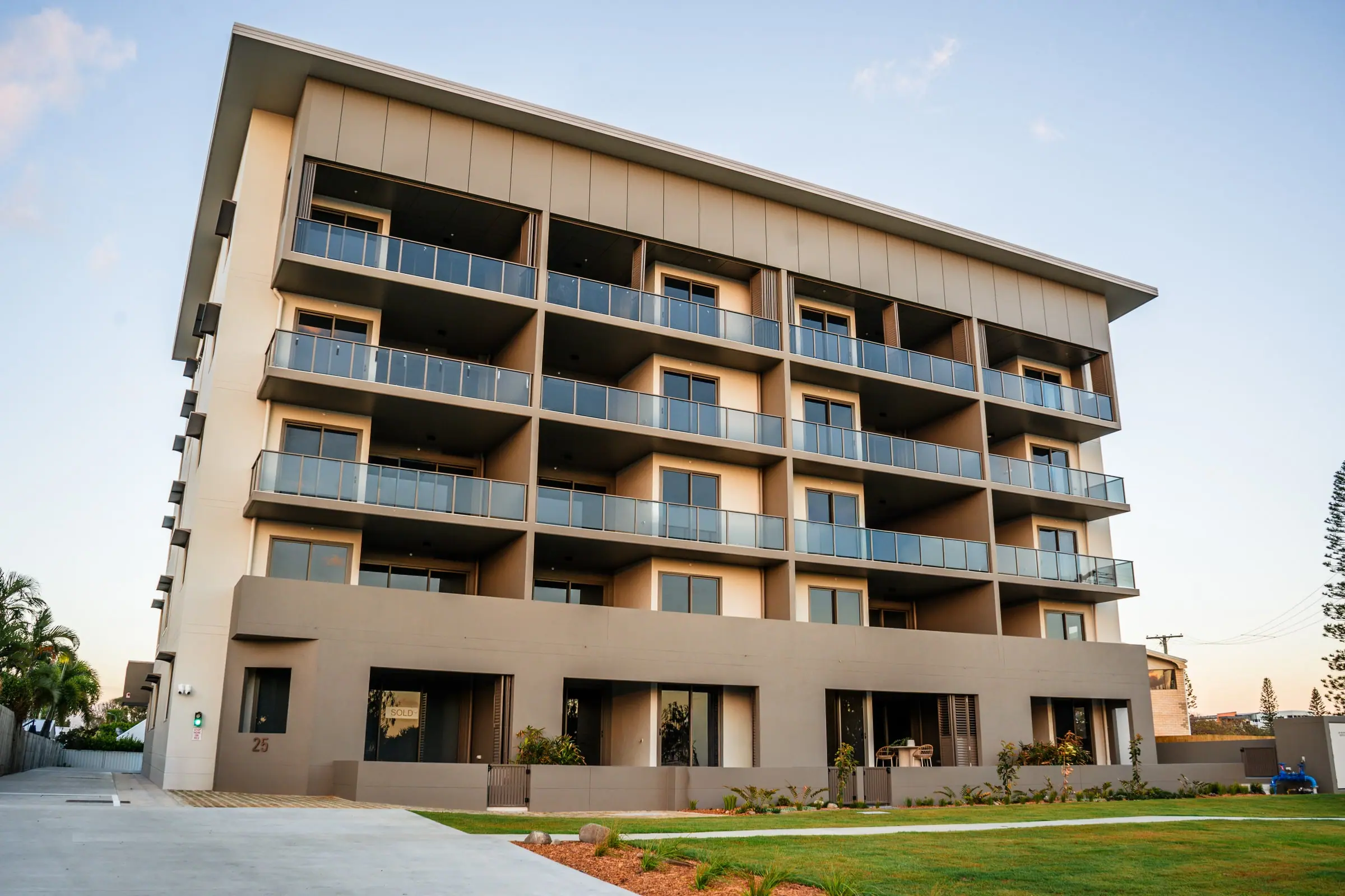 Mira Living at dusk, from the corner of the Esplanade